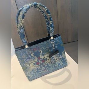 Brand New. I bought when I went to Thailand.